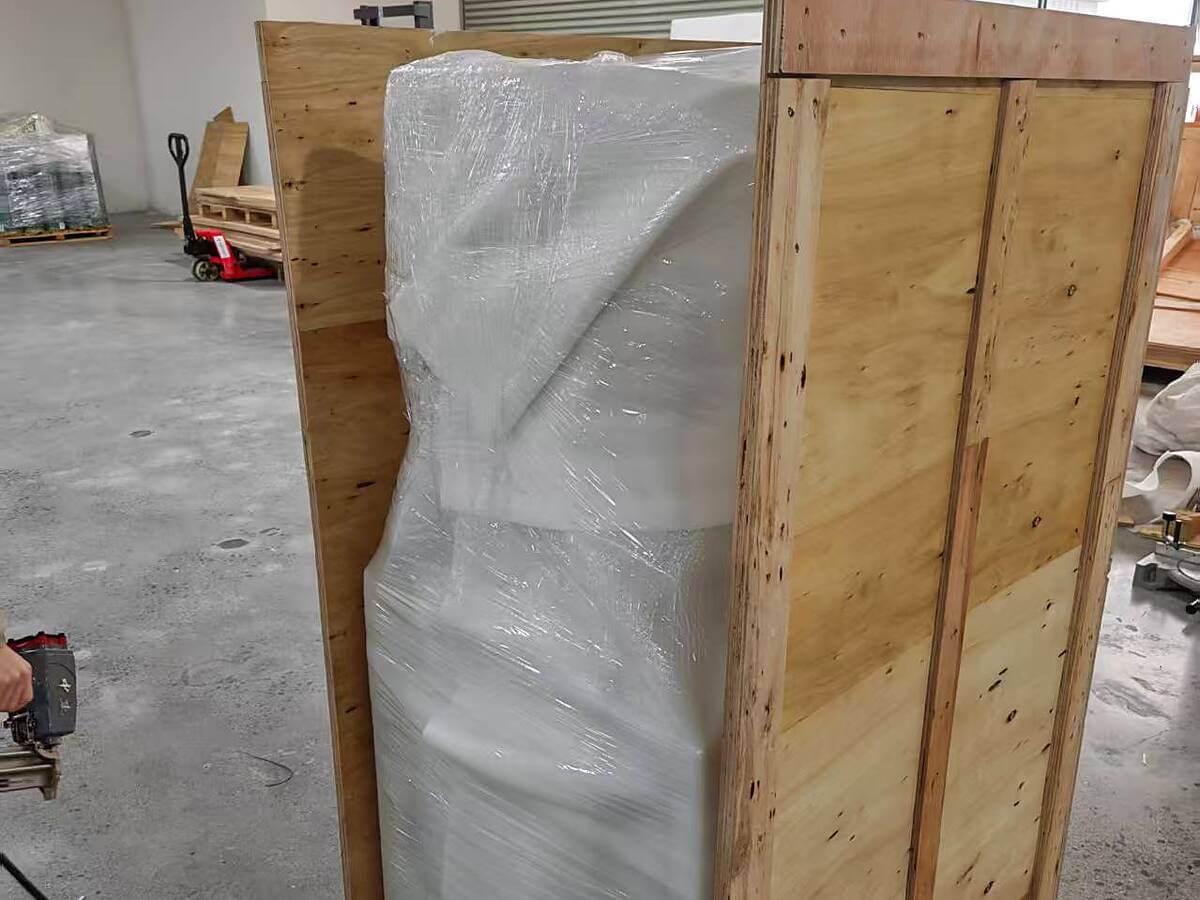 Battery assembly machines packed in wooden cases for shipment to the United States